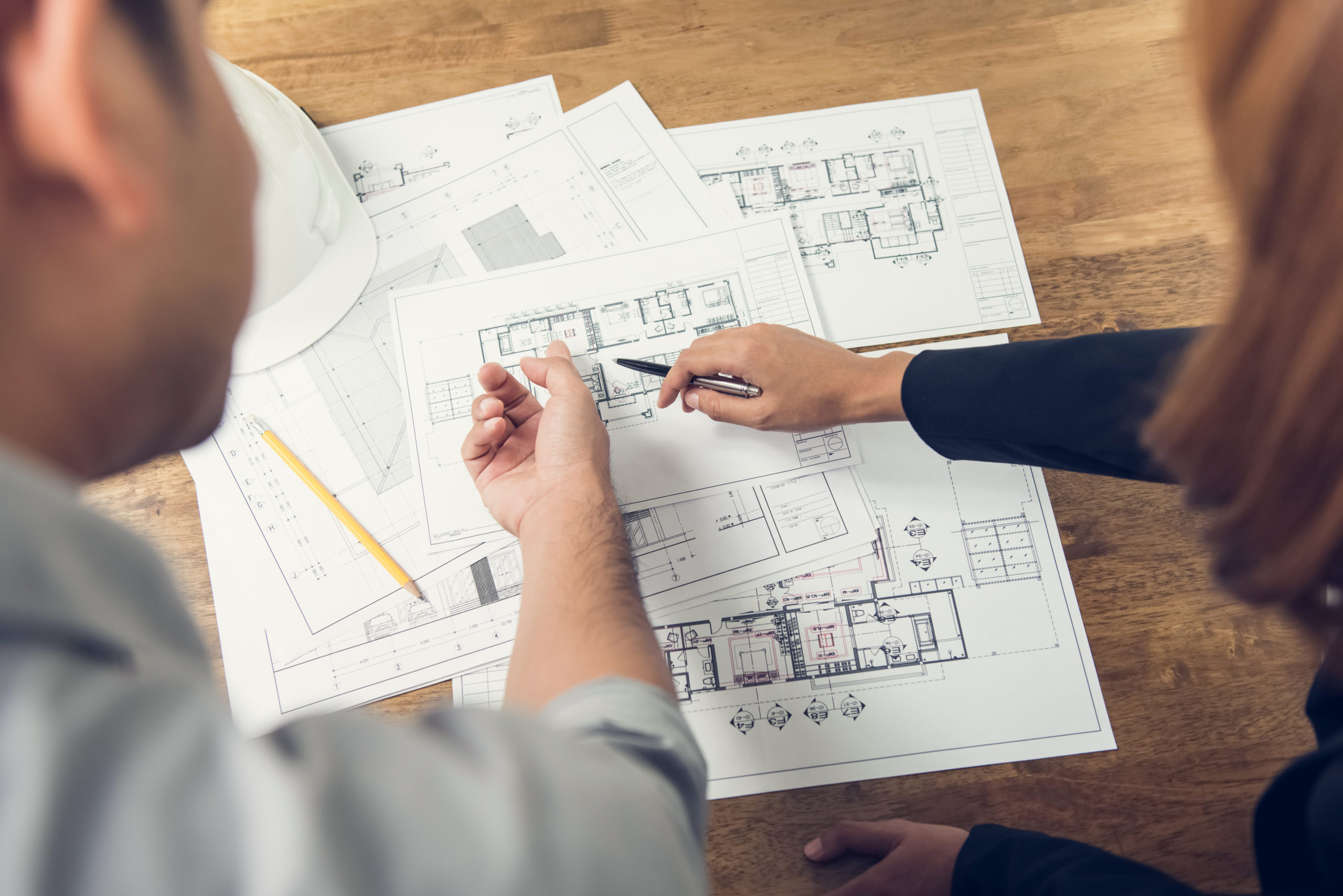engineers-reviewing-blueprints